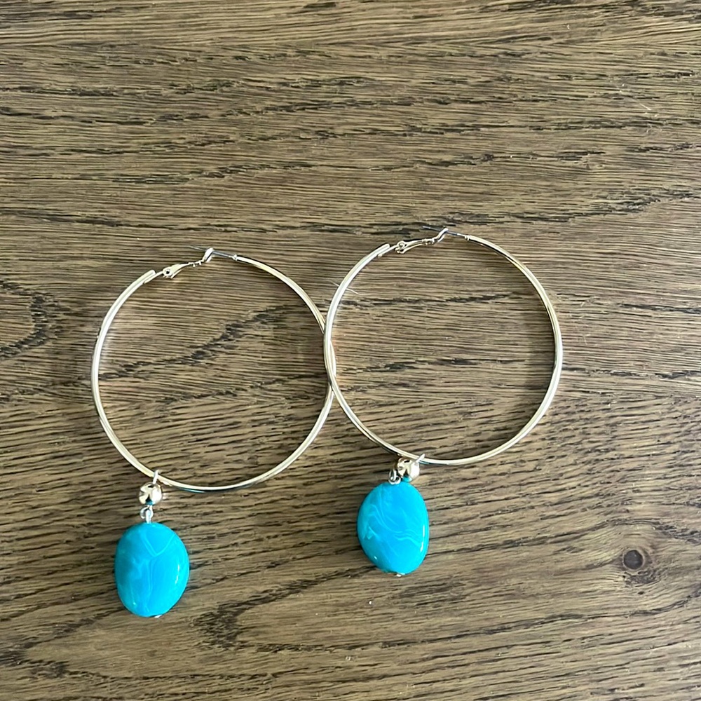Gold hoop earrings with faux marble stone charm